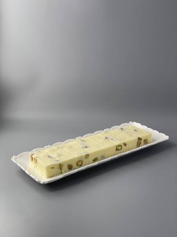 Homemade artisan white fudge with pistachios
